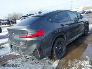 2023 BMW X4 xDrive30i with VIN 5UX33DT08P9S91679, listed as a IAAI auction lot 41705086 with 23,534 mi miles. Bid and sale history available at carsss.com. Image 4.