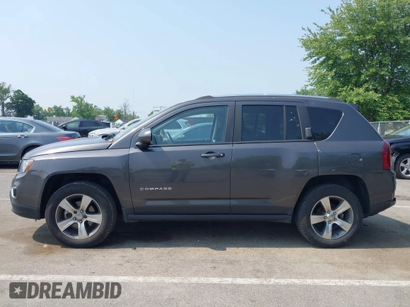2017 Jeep Compass Latitude with VIN 1C4NJDEB4HD114026, listed as a IAAI auction lot 42449519 with 97,877 mi miles and . Bid and sale history available at DreamBid. Image 14.