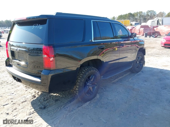 2019 Chevrolet Tahoe LT with VIN 1GNSKBKC3KR345776, listed as a IAAI auction lot 41674948 with 119,871 mi miles. Bid and sale history available at carsss.com. Image 4.