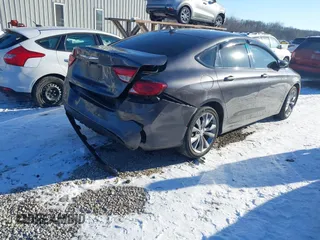 2015 Chrysler 200 S with VIN 1C3CCCBB7FN573949, listed as a IAAI auction lot 41314490 with 112,410 mi miles and . Bid and sale history available at DreamBid. Image 4.