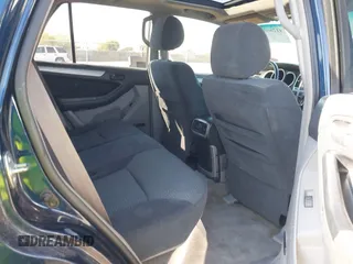 2003 Toyota 4Runner SR5 with VIN JTEZT14R238001097, listed as a IAAI auction lot 41266011 with 180,905 mi miles. Bid and sale history available at carsss.com. Image 8.
