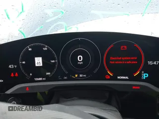 2022 Porsche Taycan GTS z VIN WP0AD2Y17NSA59692, wystawiony jako IAAI lot #41961572 z przebiegiem 12 680 mil mil oraz . Historia ofert i sprzedaży dostępna na DreamBid. Obrazek 7.