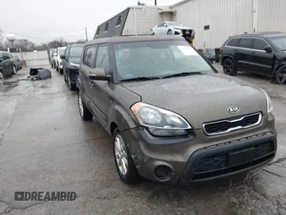 2012 Kia Soul + with VIN KNDJT2A67C7426869, listed as a IAAI auction lot 41941698 with 117,815 mi miles. Bid and sale history available at carsss.com. Image 1.