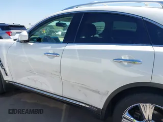 2011 Infiniti FX z VIN JN8AS1MW8BM734422, wystawiony jako IAAI lot #41896612 z przebiegiem 153 404 mil mil oraz . Historia ofert i sprzedaży dostępna na DreamBid. Obrazek 14.