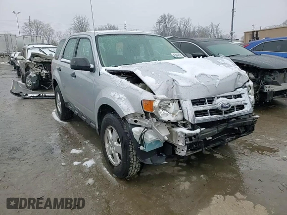 2010 Ford Escape XLS с VIN 1FMCU0C77AKD47899, выставлен на аукционе Copart как лот 45043535 с пробегом Не указан миль и Списание • Salvage title. История ставок и продаж доступна на DreamBid. Изображение 11.