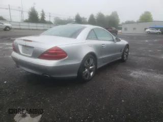 2005 Mercedes-Benz SL 500 with VIN WDBSK75F05F094991, listed as a Copart auction lot 61678705 with 128,123 mi miles and Clean title. Bid and sale history available at DreamBid. Image 3.