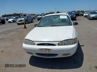 1997 Ford Escort LX z VIN 1FALP13P6VW331635, wystawiony jako IAAI lot #42338881 z przebiegiem 117 385 mil mil oraz . Historia ofert i sprzedaży dostępna na DreamBid. Obrazek 6.