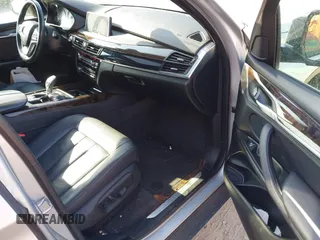 2018 BMW X5 xDrive35i with VIN 5UXKR0C51J0X92651, listed as a IAAI auction lot 41724974 with 83,496 mi miles. Bid and sale history available at carsss.com. Image 5.