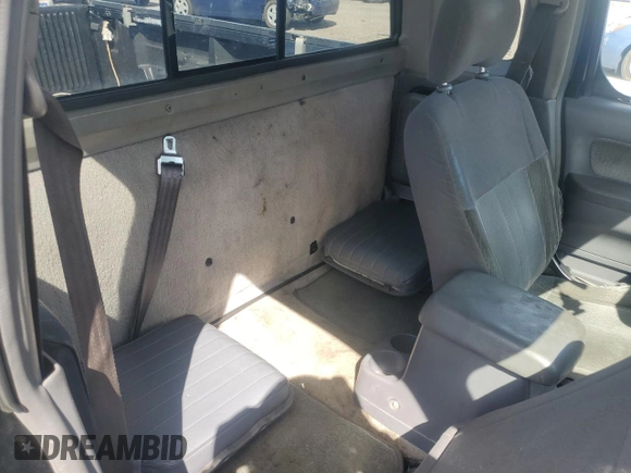 1999 Nissan Frontier XE z VIN 1N6ED26Y2XC301913, wystawiony jako Copart lot #53152165 z przebiegiem 271 272 mil mil oraz Szkoda całkowita • Salvage title. Historia ofert i sprzedaży dostępna na DreamBid. Obrazek 10.