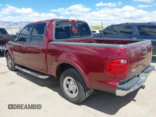 2003 Ford F-150 XLT with VIN 1FTRW07693KC11903, listed as a IAAI auction lot 41993455 with 301,023 mi miles. Bid and sale history available at carsss.com. Image 3.