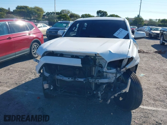 2023 Toyota Tacoma SR with VIN 3TMCZ5AN2PM649123, listed as a IAAI auction lot 41687819 with 44,383 mi miles and . Bid and sale history available at DreamBid. Image 6.