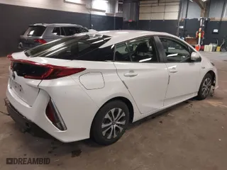 2022 Toyota Prius Prime LE with VIN JTDKAMFP4N3204257, listed as a IAAI auction lot 41823325 with 28,635 mi miles. Bid and sale history available at carsss.com. Image 4.