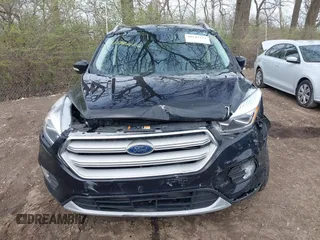 2019 Ford Escape Titanium with VIN 1FMCU9J91KUC42161, listed as a IAAI auction lot 41942122 with 100,677 mi miles and . Bid and sale history available at DreamBid. Image 12.