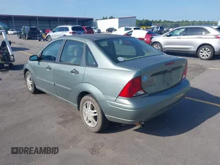 2003 Ford Focus SE with VIN 1FAFP34P13W304346, listed as a IAAI auction lot 42706827 with 239,800 mi miles and . Bid and sale history available at DreamBid. Image 3.