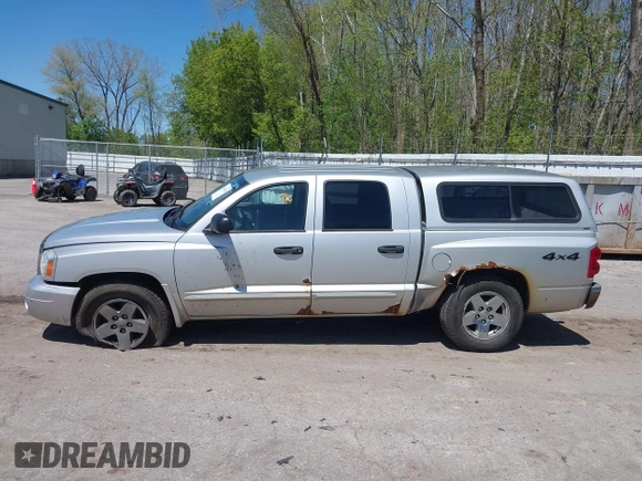 2005 Dodge Dakota SLT with VIN 1D7HW48N45S321002, listed as a IAAI auction lot 42240338 with 214,983 mi miles and . Bid and sale history available at DreamBid. Image 15.