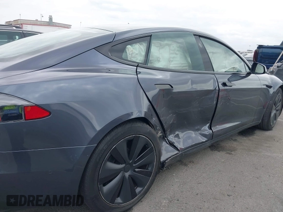 2021 Tesla Model S Long Range с VIN 5YJSA1E57MF441387, выставлен на аукционе IAAI как лот 42034307 с пробегом Не указан миль и . История ставок и продаж доступна на DreamBid. Изображение 6.