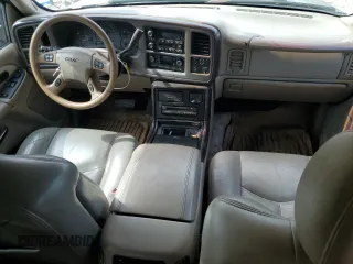 2003 GMC Sierra Denali z VIN 2GTFK69U831201215, wystawiony jako Copart lot #73801184 z przebiegiem 186 959 mil mil oraz Szkody całkowita. Historia ofert i sprzedaży dostępna na DreamBid. Obrazek 8.