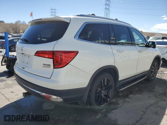 2017 Honda Pilot Touring with VIN 5FNYF6H91HB007611, listed as a Copart auction lot 47217175 with 107,349 mi miles and Salvage Title. Bid and sale history available at DreamBid. Image 3.