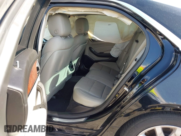2015 Cadillac CTS RWD with VIN 1G6AP5SX8F0140364, listed as a IAAI auction lot 42535236 with 126,277 mi miles and . Bid and sale history available at DreamBid. Image 8.
