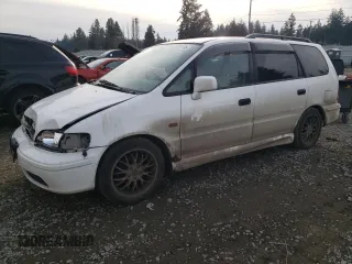 1998 Honda Odyssey with VIN RA31038664, listed as a Copart auction lot 43051785 with 106,084 mi miles and Salvage title. Bid and sale history available at DreamBid. Image 1.