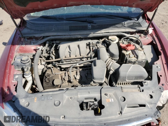 2014 Ford Taurus Limited z VIN 1FAHP2F82EG141034, wystawiony jako Copart lot #52579995 z przebiegiem 207 709 mil mil oraz Szkoda całkowita • Salvage title. Historia ofert i sprzedaży dostępna na DreamBid. Obrazek 13.