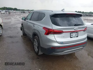 2023 Hyundai Santa Fe SE with VIN 5NMS14AJ5PH626769, listed as a IAAI auction lot 42637931 with 10,712 mi miles and . Bid and sale history available at DreamBid. Image 3.