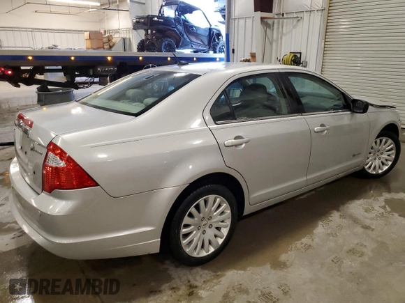 2010 Ford Fusion Hybrid with VIN 3FADP0L32AR142750, listed as a Copart auction lot 62395305 with 144,384 mi miles and Salvage title. Bid and sale history available at DreamBid. Image 3.