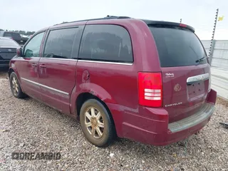 2009 Chrysler Town & Country Touring with VIN 2A8HR54169R618640, listed as a IAAI auction lot 42210905 with 227,420 mi miles and . Bid and sale history available at DreamBid. Image 3.