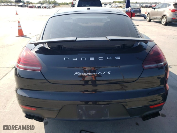2014 Porsche Panamera GTS with VIN WP0AF2A73EL083388, listed as a Copart auction lot 74312004 with 106,386 mi miles and Salvage Title. Bid and sale history available at carsss.com. Image 6.