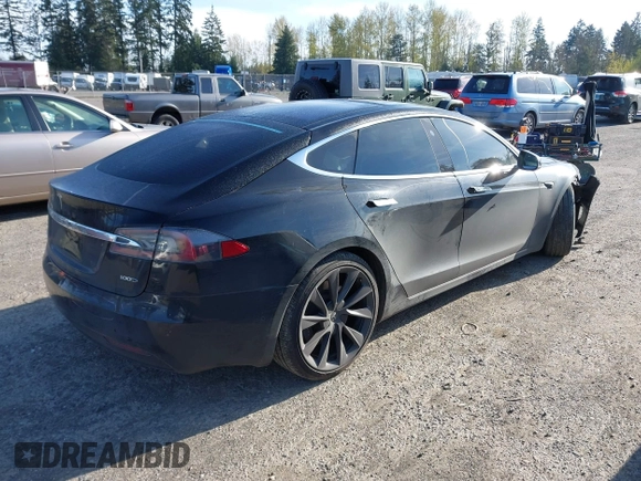 2018 Tesla Model S 75D with VIN 5YJSA1E28JF273809, listed as a IAAI auction lot 42029434 with 85,972 mi miles and . Bid and sale history available at DreamBid. Image 4.