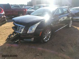 2013 Cadillac XTS Luxury with VIN 2G61P5S32D9220789, listed as a IAAI auction lot 41284853 with 178,507 mi miles. Bid and sale history available at carsss.com. Image 16.