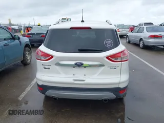 2016 Ford Escape Titanium with VIN 1FMCU9JX4GUB72080, listed as a IAAI auction lot 42519240 with 121,793 mi miles and . Bid and sale history available at DreamBid. Image 16.