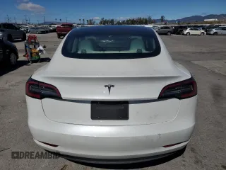 2022 Tesla Model 3 with VIN 5YJ3E1EAXNF203914, listed as a Copart auction lot 46982935 with 70,766 mi miles and Salvage Title. Bid and sale history available at DreamBid. Image 6.