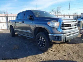 2015 Toyota Tundra 4WD Truck SR5 with VIN 5TFDW5F13FX459276, listed as a IAAI auction lot 41272409 with 163,737 mi miles. Bid and sale history available at carsss.com. Image 1.