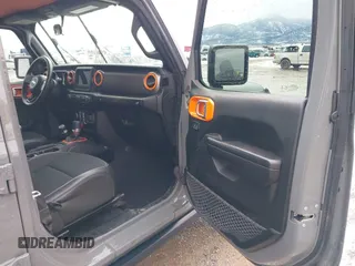 2021 Jeep Wrangler Unlimited Willys with VIN 1C4HJXDN6MW664417, listed as a IAAI auction lot 41598605 with 37,963 mi miles and . Bid and sale history available at DreamBid. Image 5.