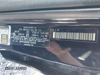 2024 Kia Forte GT-Line z VIN 3KPF54AD9RE794408, wystawiony jako IAAI lot #41987901 z przebiegiem 13 157 mil mil oraz . Historia ofert i sprzedaży dostępna na DreamBid. Obrazek 9.