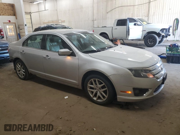 2011 Ford Fusion SEL with VIN 3FAHP0JA3BR336871, listed as a Copart auction lot 50832945 with 209,834 mi miles and Salvage Title. Bid and sale history available at DreamBid. Image 4.