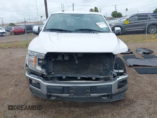 2018 Ford F-150 XL with VIN 1FTEW1E56JKC02331, listed as a IAAI auction lot 42554412 with 203,633 mi miles and . Bid and sale history available at DreamBid. Image 13.