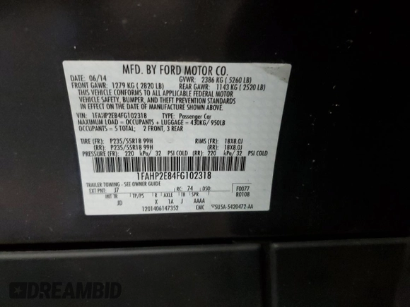 2015 Ford Taurus SEL with VIN 1FAHP2E84FG102318, listed as a Copart auction lot 61744685 with 82,149 mi miles and Salvage title. Bid and sale history available at DreamBid. Image 12.