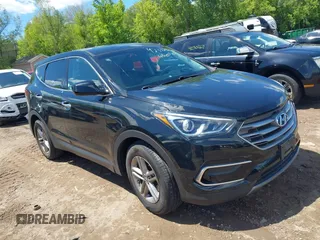 2017 Hyundai Santa Fe 2.4L z VIN 5NMZTDLB1HH044457, wystawiony jako IAAI lot #42332866 z przebiegiem 154 438 mil mil oraz . Historia ofert i sprzedaży dostępna na DreamBid. Obrazek 1.