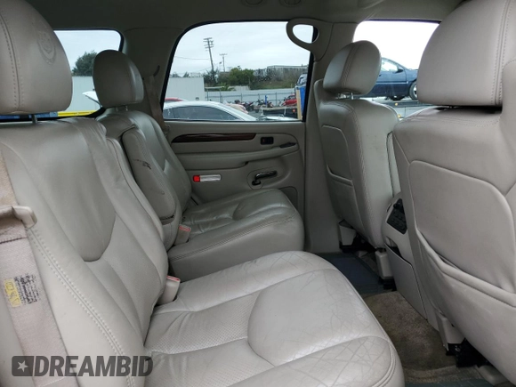 2003 Cadillac Escalade z VIN 1GYEC63T93R208877, wystawiony jako Copart lot #83894424 z przebiegiem 160 530 mil mil oraz Szkoda całkowita • Salvage title. Historia ofert i sprzedaży dostępna na DreamBid. Obrazek 11.