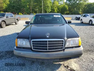 1992 Mercedes-Benz 300 with VIN WDBGB34E8NA061712, listed as a Copart auction lot 55837085 with 219,090 mi miles and Clean Title. Bid and sale history available at DreamBid. Image 5.