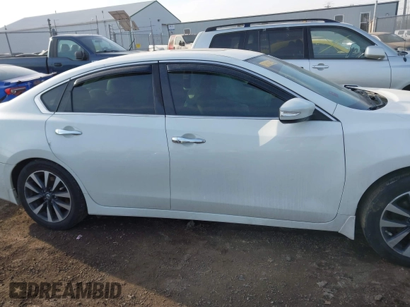 2016 Nissan Altima SR with VIN 1N4AL3AP8GC169495, listed as a IAAI auction lot 41792151 with 131,918 mi miles and . Bid and sale history available at carsss.com. Image 14.