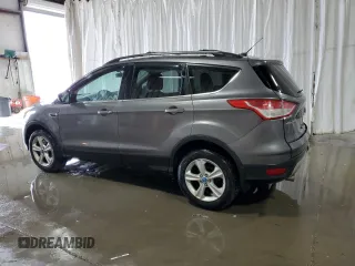 2013 Ford Escape SE with VIN 1FMCU9G98DUC73305, listed as a Copart auction lot 54542445 with 178,945 mi miles and Salvage Title. Bid and sale history available at DreamBid. Image 2.