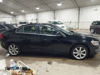 2016 Volvo S60 T5 Drive-E Premier with VIN YV126MFK9G2405922, listed as a IAAI auction lot 41559537 with 60,830 mi miles. Bid and sale history available at carsss.com. Image 13.