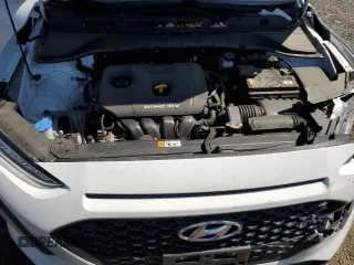 2021 Hyundai Kona SE z VIN KM8K1CAA7MU659637, wystawiony jako Copart lot #54394795 z przebiegiem 90 366 mil mil oraz Szkody całkowita. Historia ofert i sprzedaży dostępna na DreamBid. Obrazek 11.