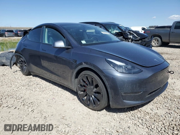 2022 Tesla Model Y Performance with VIN 7SAYGDEF1NF466938, listed as a Copart auction lot 53678045 with 50,135 mi miles and Salvage Title. Bid and sale history available at DreamBid. Image 4.