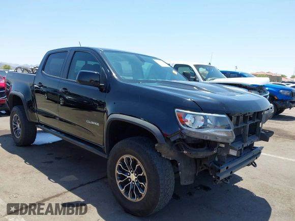 2018 Chevrolet Colorado 4WD ZR2 z VIN 1GCGTEEN5J1259764, wystawiony jako IAAI lot #42474810 z przebiegiem 111 187 mil mil oraz . Historia ofert i sprzedaży dostępna na DreamBid. Obrazek 1.