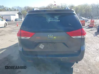 2014 Toyota Sienna XLE with VIN 5TDYK3DC5ES475750, listed as a IAAI auction lot 41976805 with 221,804 mi miles. Bid and sale history available at carsss.com. Image 16.