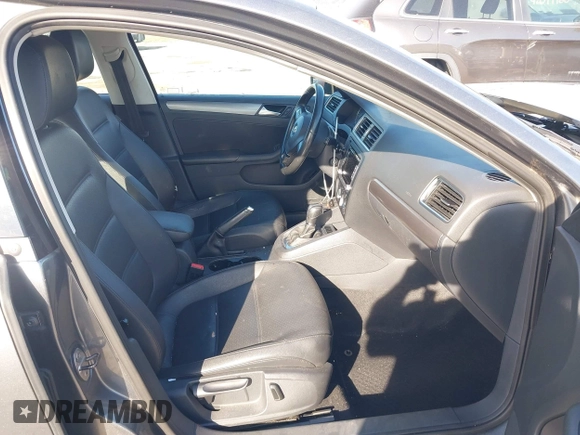 2013 Volkswagen Jetta TDI w/Premium z VIN 3VWLL7AJ6DM291317, wystawiony jako IAAI lot #42091621 z przebiegiem 169 448 mil mil oraz . Historia ofert i sprzedaży dostępna na DreamBid. Obrazek 5.